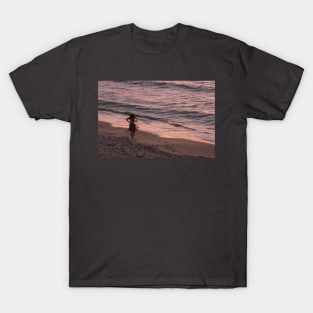 Girl on a beach, dusk T-Shirt